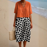 Penelope - Orange Dress with Contrasting Dots
