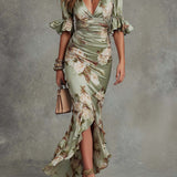 Anna - Asymmetrical long dress in green satin with V-neck, flared puff sleeves, and floral pattern